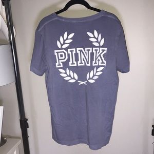 A Pink Victoria Secret shirt